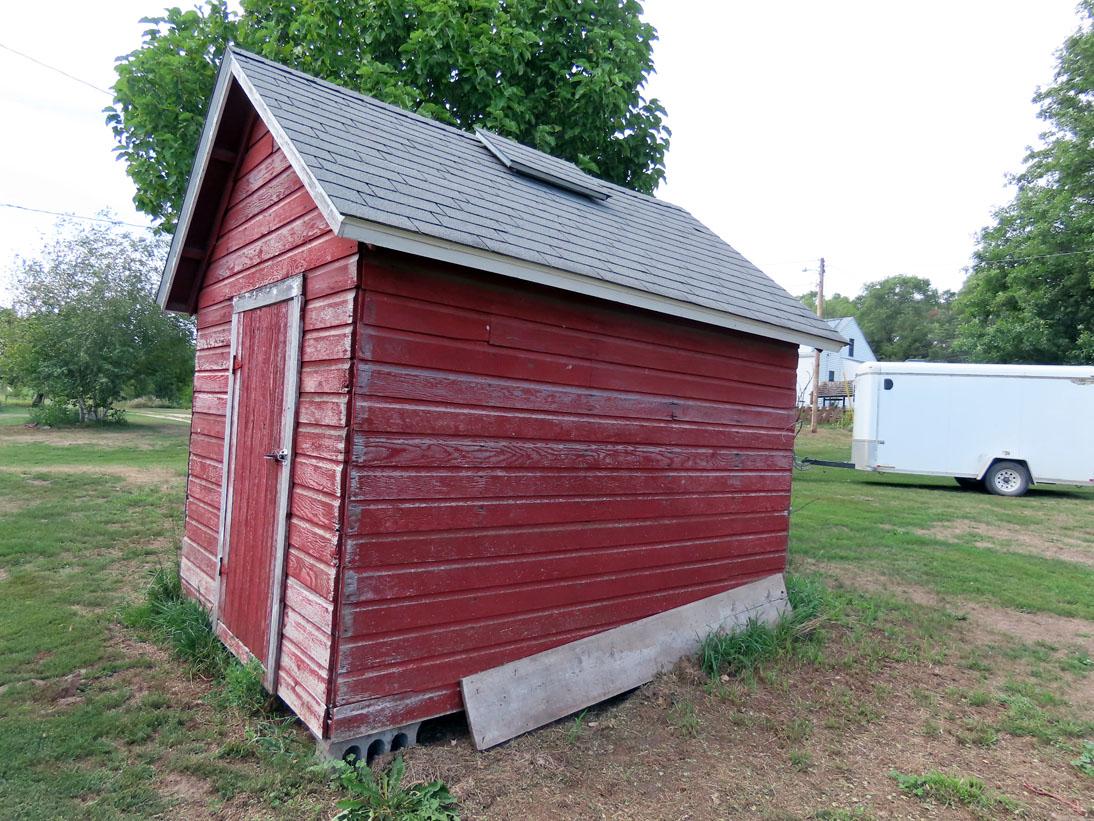 Tract #1 - This Lovely Home and Building Site features an older Farm Home that has been very tastefu