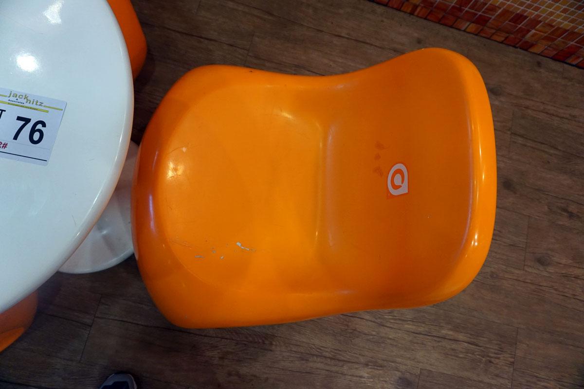 Round Plastic Table & (3) Orange Chairs.