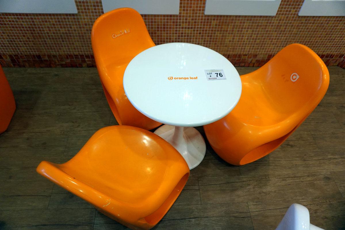 Round Plastic Table & (3) Orange Chairs.