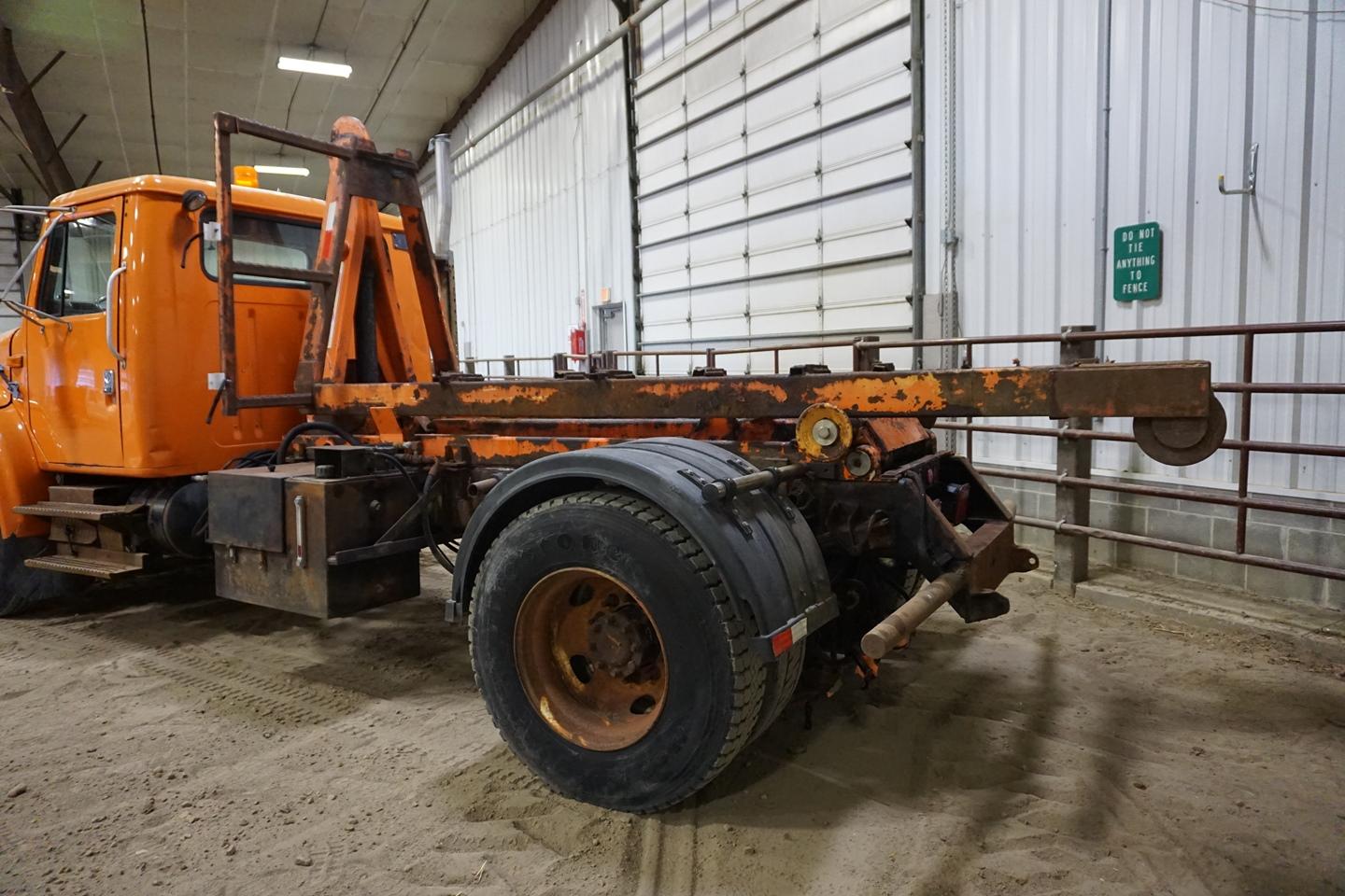 1999 IHC Model 4700 1-Axle Hook Truck, VIN# 1HTSCAARXXR656501, DT466E Diesel Engine, Allison Automat