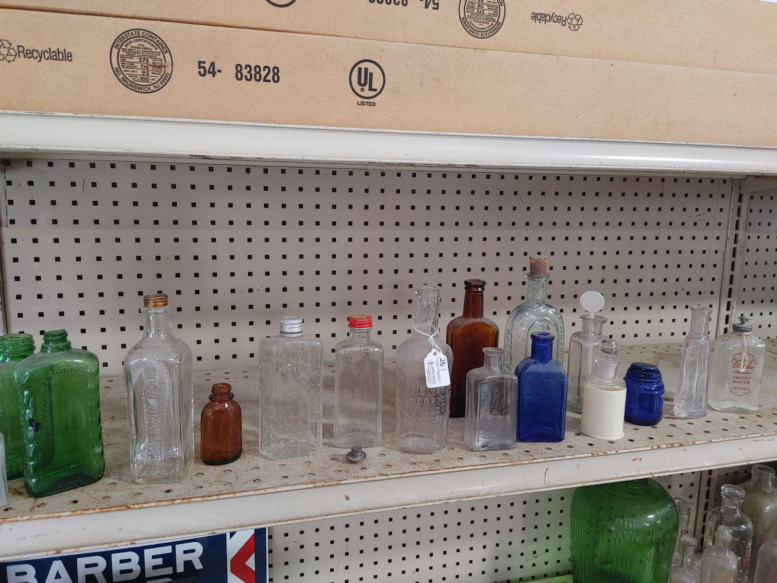 (18+/-) Vintage Advertising Bottles