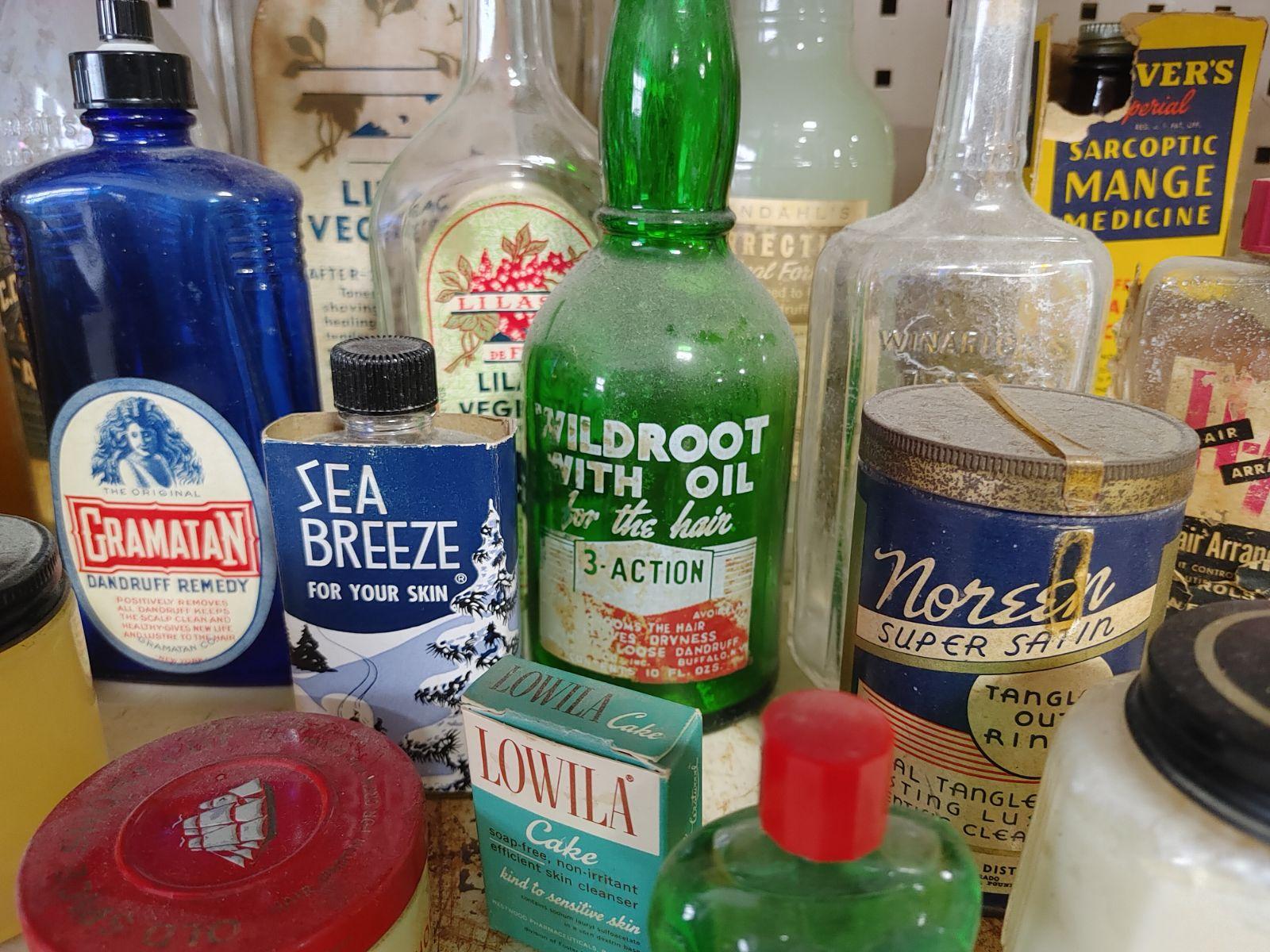 (50+/-) Vintage Barber Shop and Apothecary Advertising Bottles and Tins