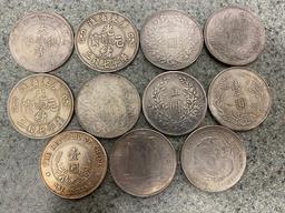 (11) Facsimile Chinese Silver Dollars (not silver)