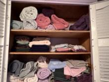 Cabinet Of Towels & Cleaning Supplies