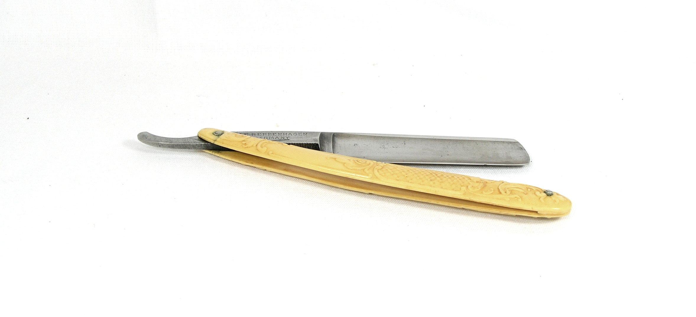 M.E. Reppenhagen,  Germany "Diamondine" No. 7 straight razor .  Round point