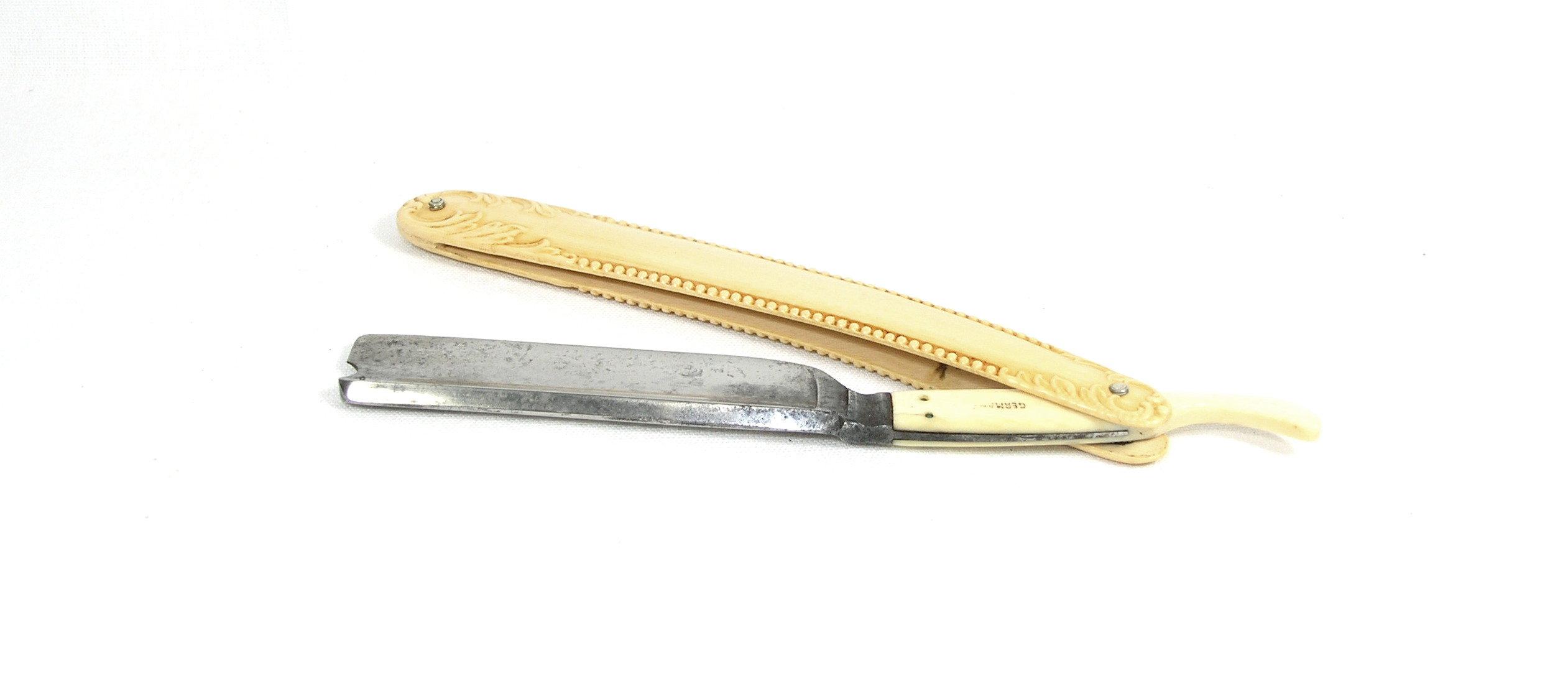 John Pritzlaff Hardware Co.  Germany hollow point blade straight razor with