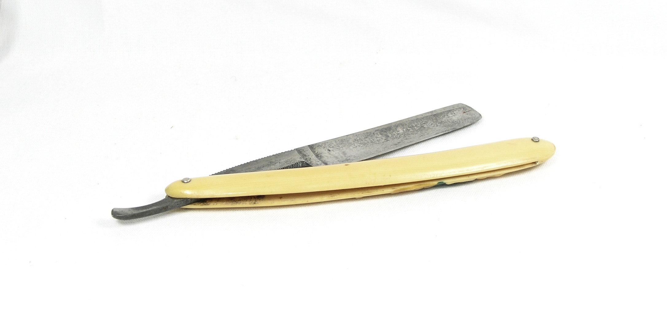 Simmons Hardware Co. Germany ,  No. 1359 straight razor with embossed ivory