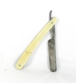 Geo. Butler & Co.  Sheffield, Eng.  Round point blade straight razor with S