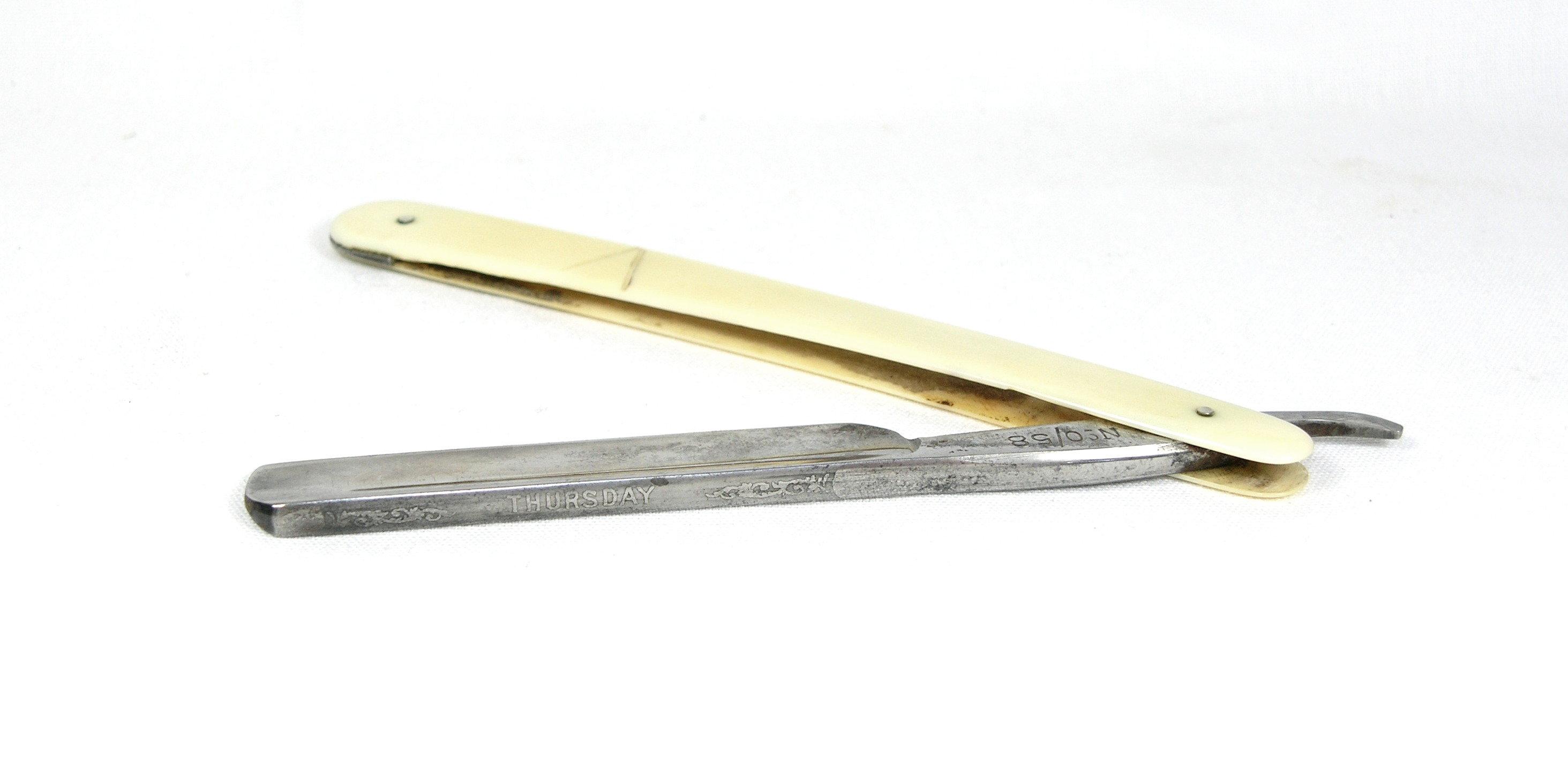 Geo. Butler & Co.  Sheffield, Eng.  Round point blade straight razor with S