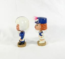 1960s Baltimore Colts "My Hero" Boy and Girl Kissing Bobbleheads Set. Gold