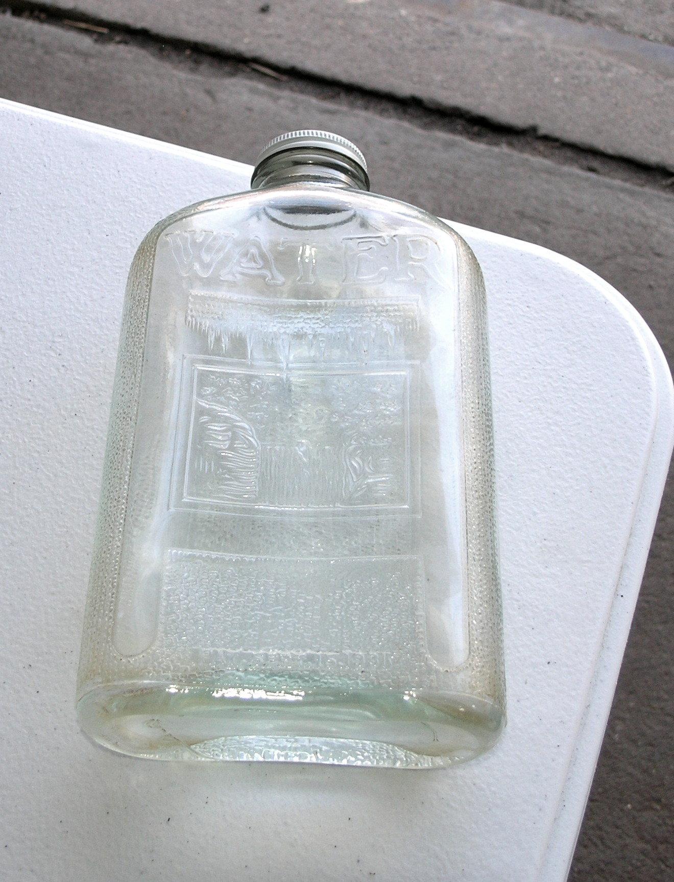 Vintage 1930's "Hemingray " Glass Refrigerator Bottle with the word WATER o