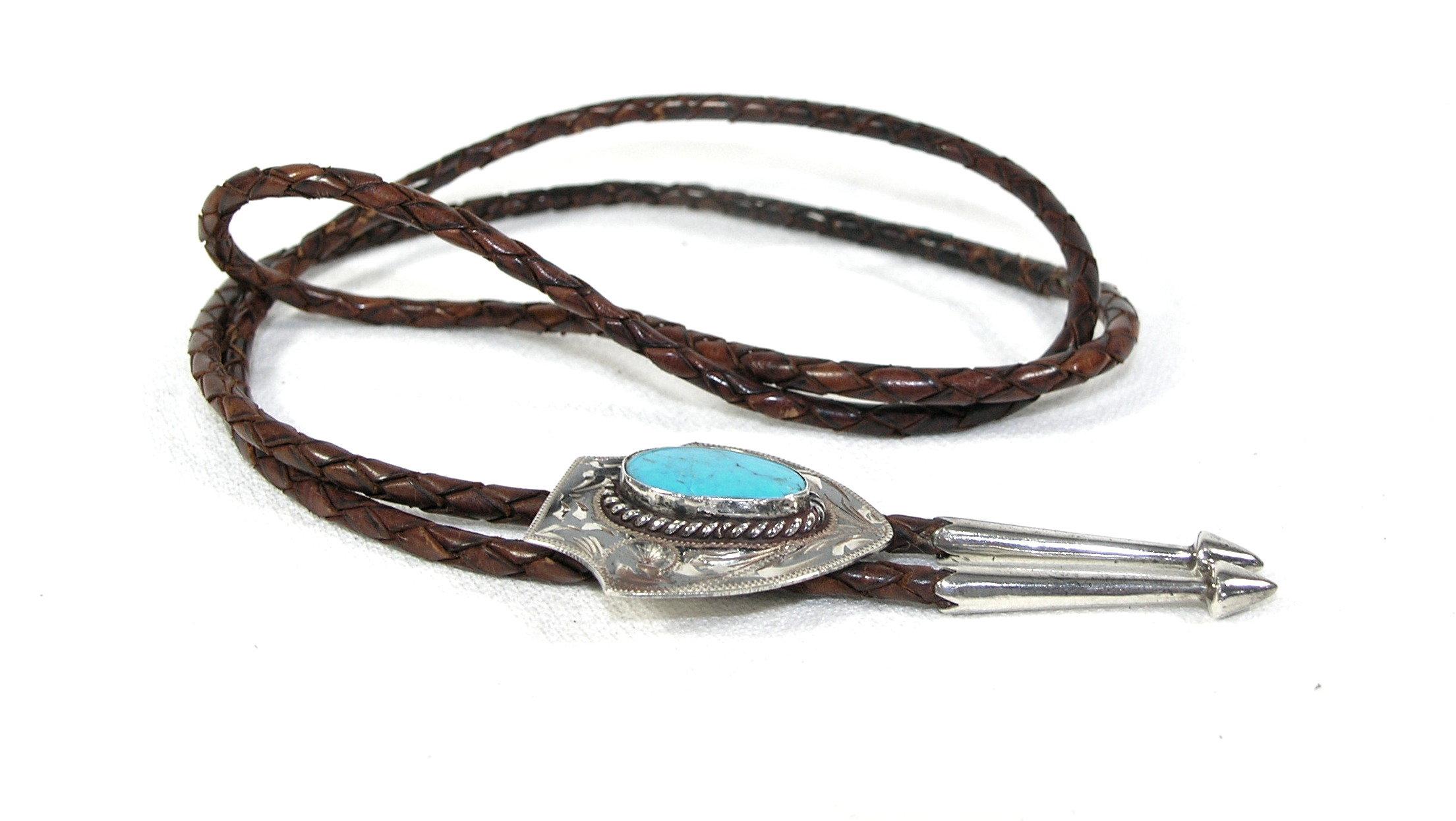 Vintage Southwest United States Brown Leather Bolo Tie With Arrowhead Shape