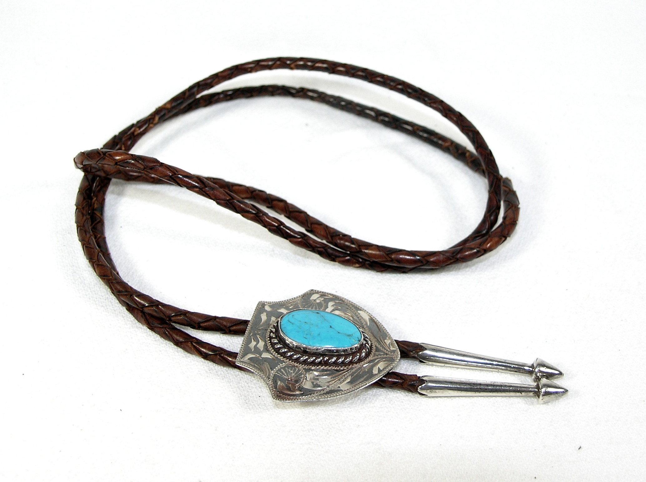 Vintage Southwest United States Brown Leather Bolo Tie With Arrowhead Shape