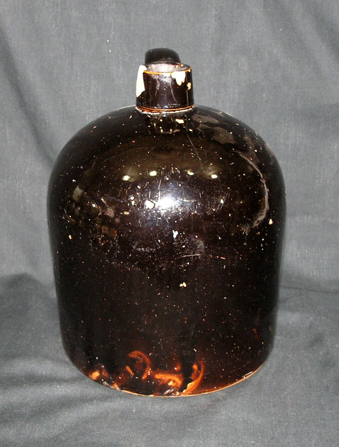 Vintage Unmarked Dark Brown Stoneware Jug Has Chip On Spout Otherwise In Go