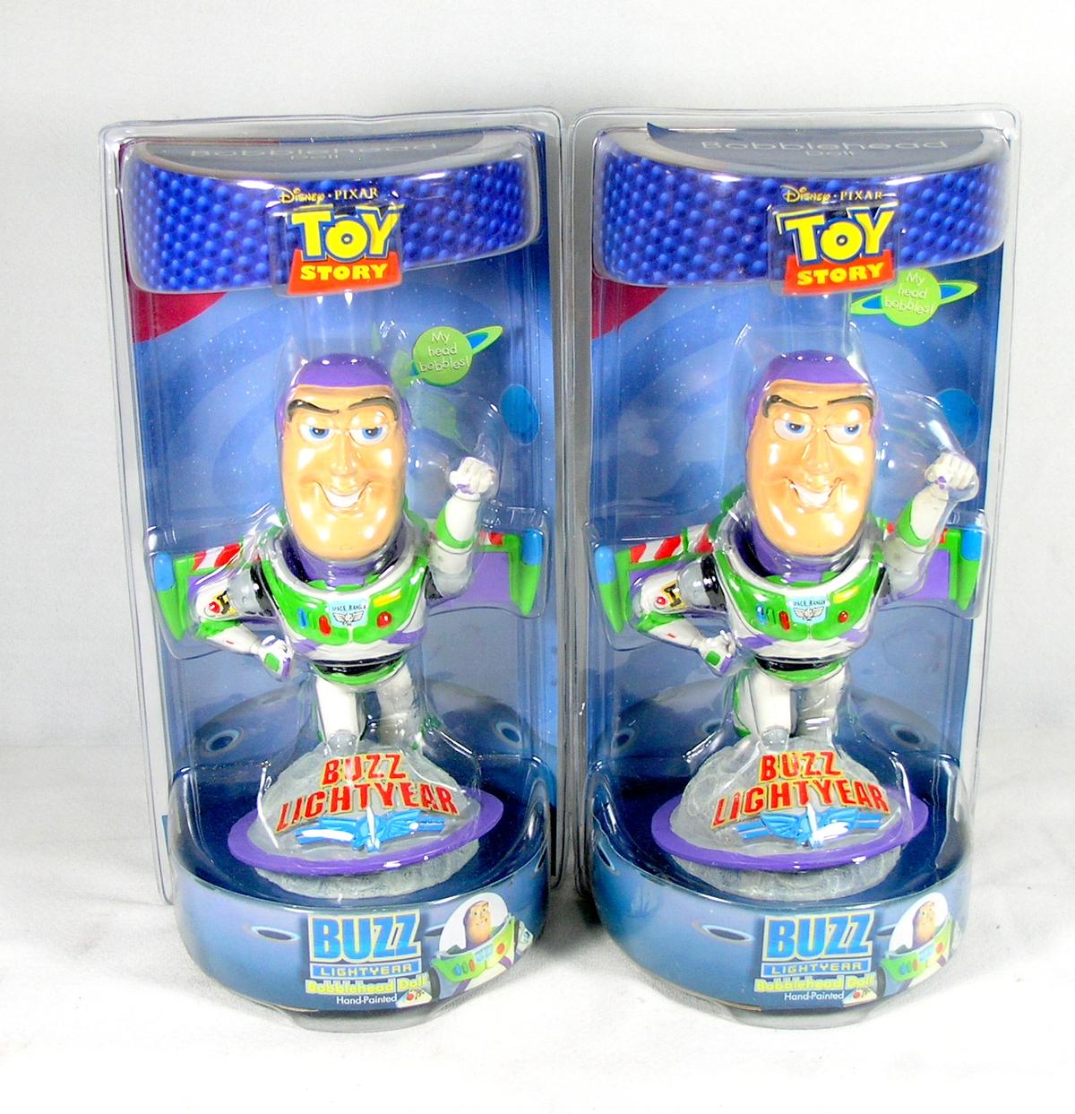 (2) Alexander Global Promotions INC. Disneys Buzz Lightyear Hand Painted Bo