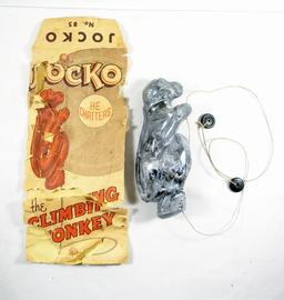 Vintage Jocko No. 85 Plastic Climbing Monkey. Works. Also original bag in P