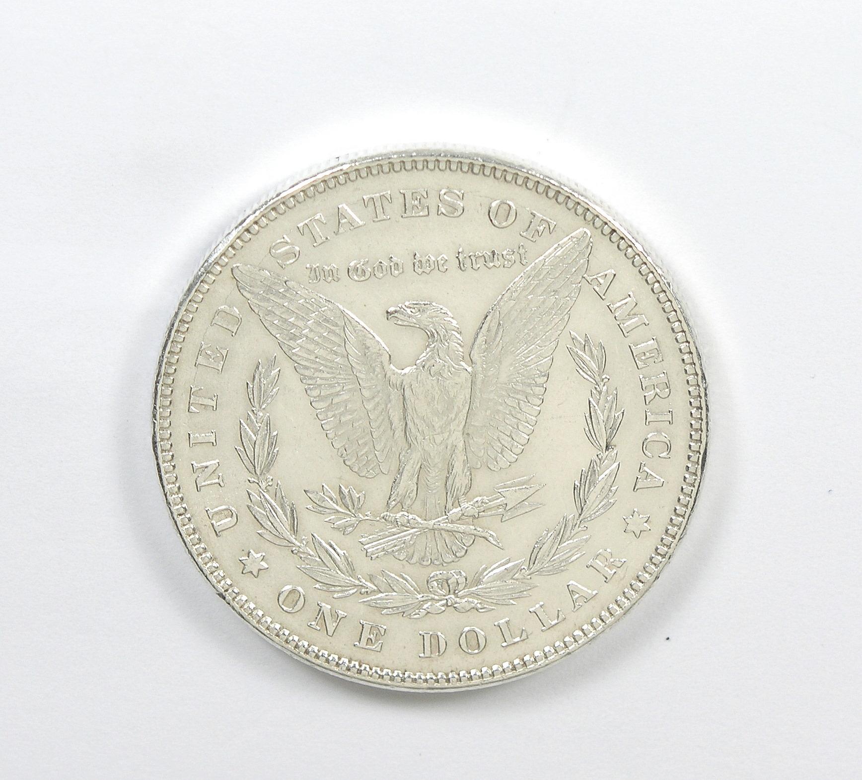 218.    1878   Morgan Silver Dollar “7/8 Tail Feathers”