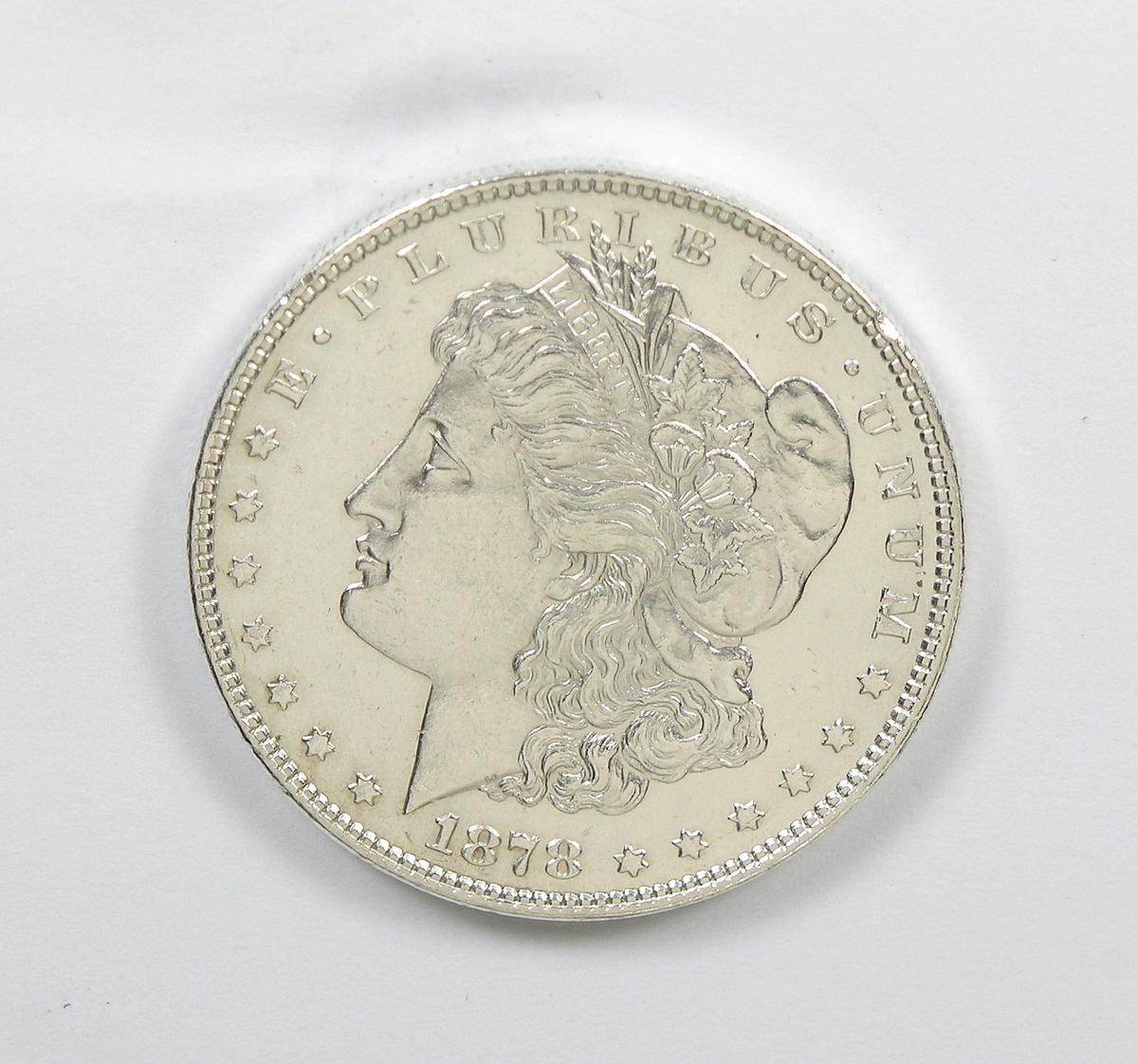 218.    1878   Morgan Silver Dollar “7/8 Tail Feathers”