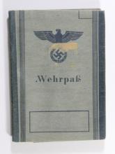 WWII German Wehrpass/ID Book.  It has the original photo still inside.