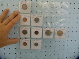 121 Southern Africa coins in notebook