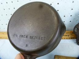 Cast iron skillet & cornbread pan; wooden spatula