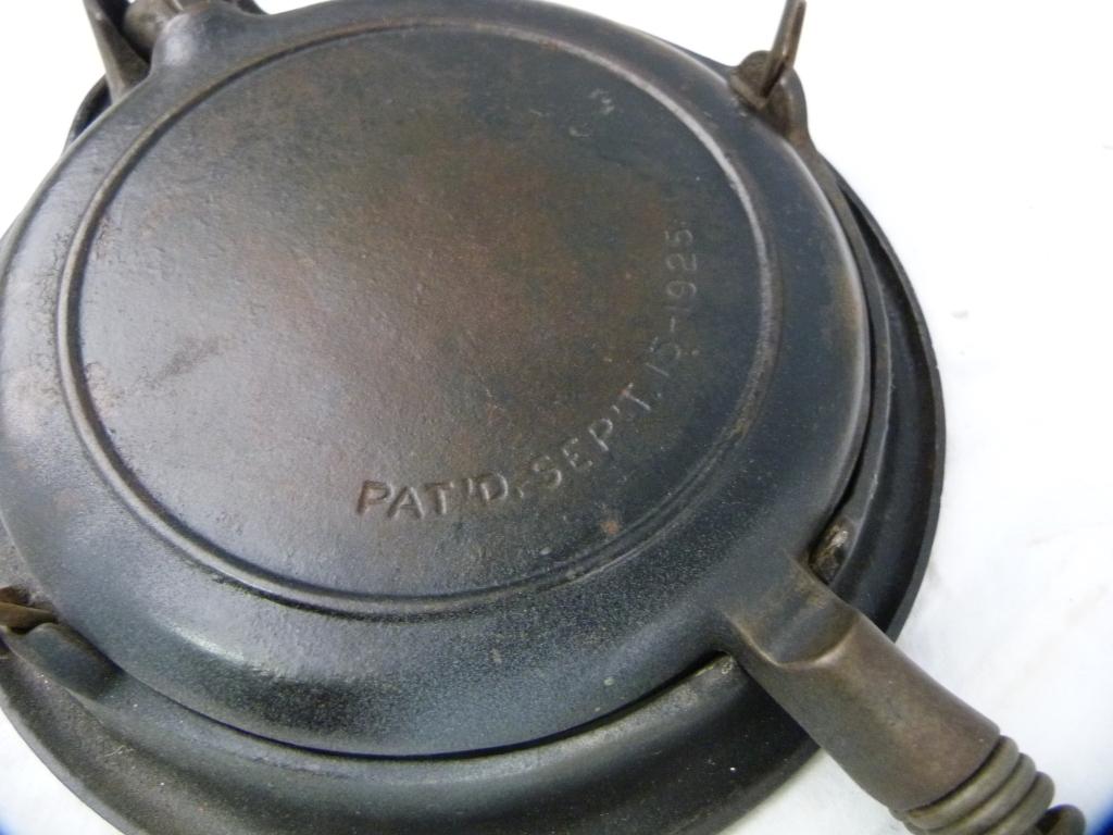 Cast iron waffle iron stamped Pat'd Sept 15-1925, 15-1/2" L