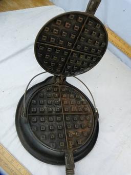 Cast iron waffle iron stamped Pat'd Sept 15-1925, 15-1/2" L