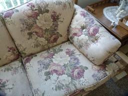 Justice upholstered flowered couch. - 83" L