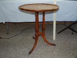 Round top, 3 legged parlor table, serpentine edge - 27-1/4" T, 24-1/4" D