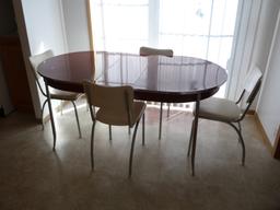 Oval enamel top table with chrome legs and one leaf.  - Howell Chrome Steel