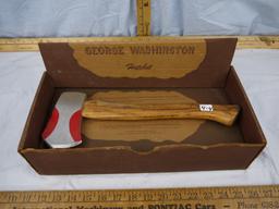 George Washington hatchet doorstop, 13-1/2" Long - Newton Mfg Co. Newton, IA with box.