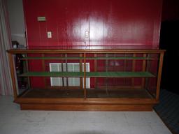 8 ft. Simmons oak display cabinet with sliding glass doors - 2 front & 1 side glass panels removed