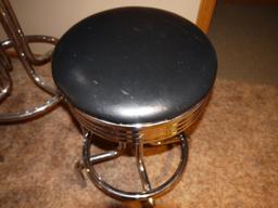 Newer chrome leg tall bar table with 2 stools; table 40-1/2" T x 30" diameter; stools 28-1/2" T