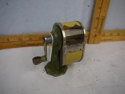 The Gem pencil sharpener, table top mount, 3-1/2" tall, celluloid catch container