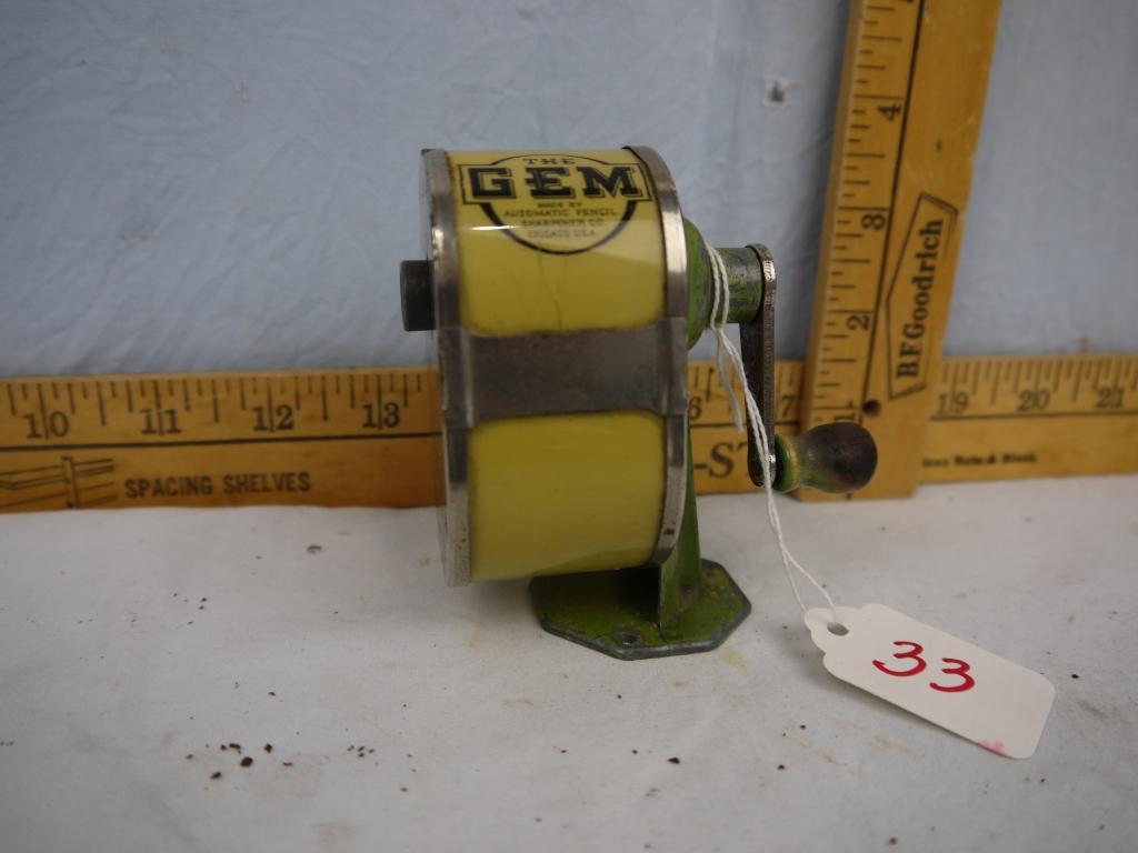 The Gem pencil sharpener, table top mount, 3-1/2" tall, celluloid catch container