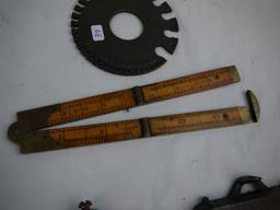 (5) Tools: (2) folding rulers, (2) levels, wire gauge