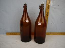 (2) colored glass "picnic" bottles with caps & bails