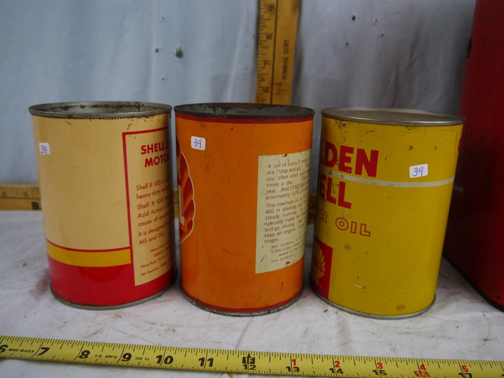 (4) empty Shell oil cans