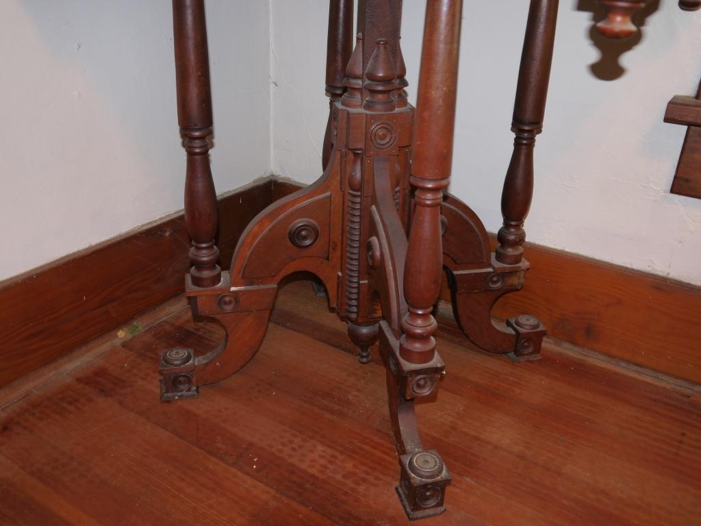 Fancy parlor table, top is split on top and has extra nails