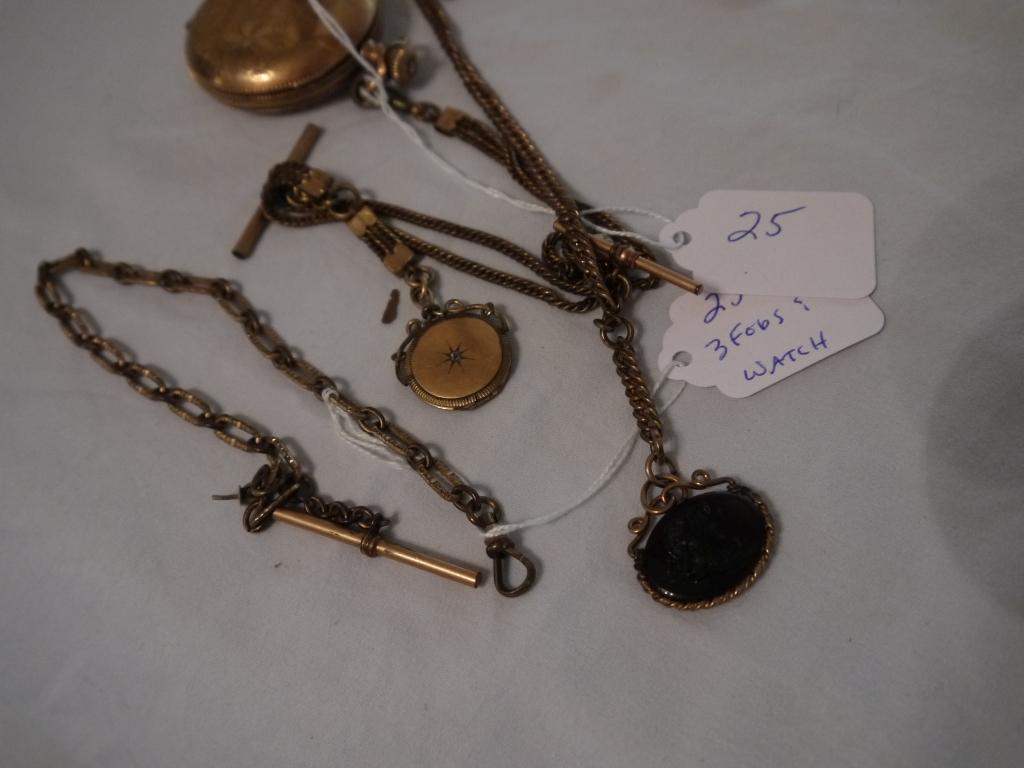 Elgin 7 jewel hunting case pocket watch with fob and 2 other fobs