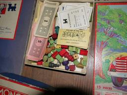 Games: Pick-up Sticks, MB 4920 Game of the States, Monopoly with wood pieces, puppet