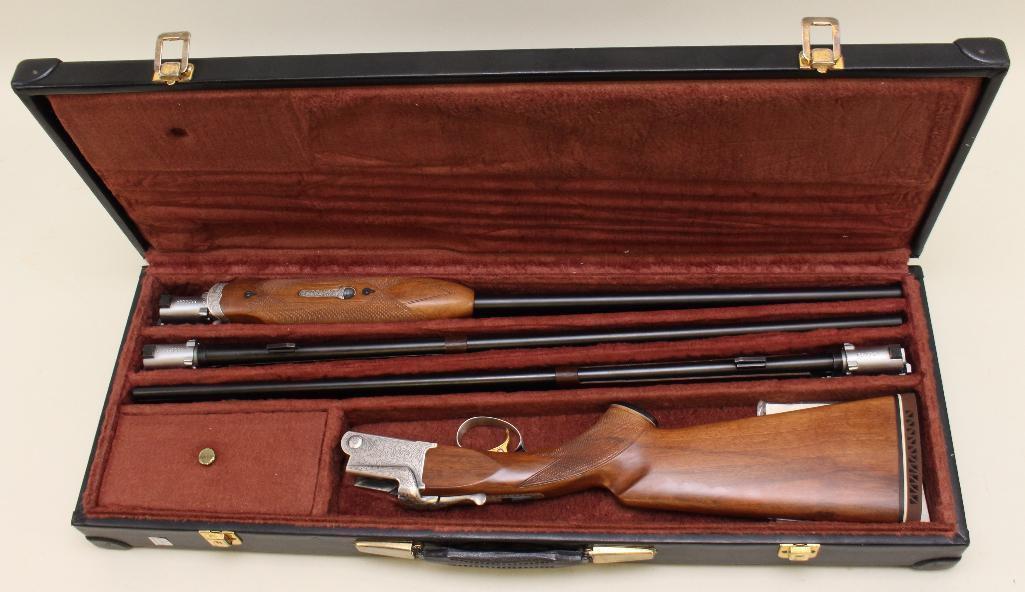 Cased 3-barrel set Ithaca-SKB Model 600 over/under shotgun.