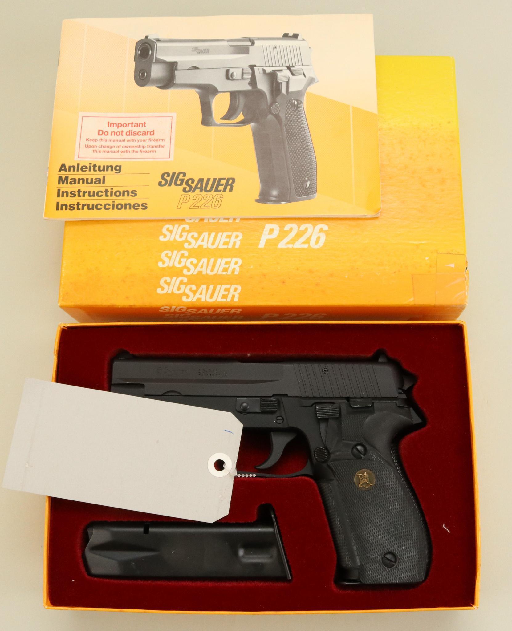 Sig Sauer P226 semi-automatic pistol.