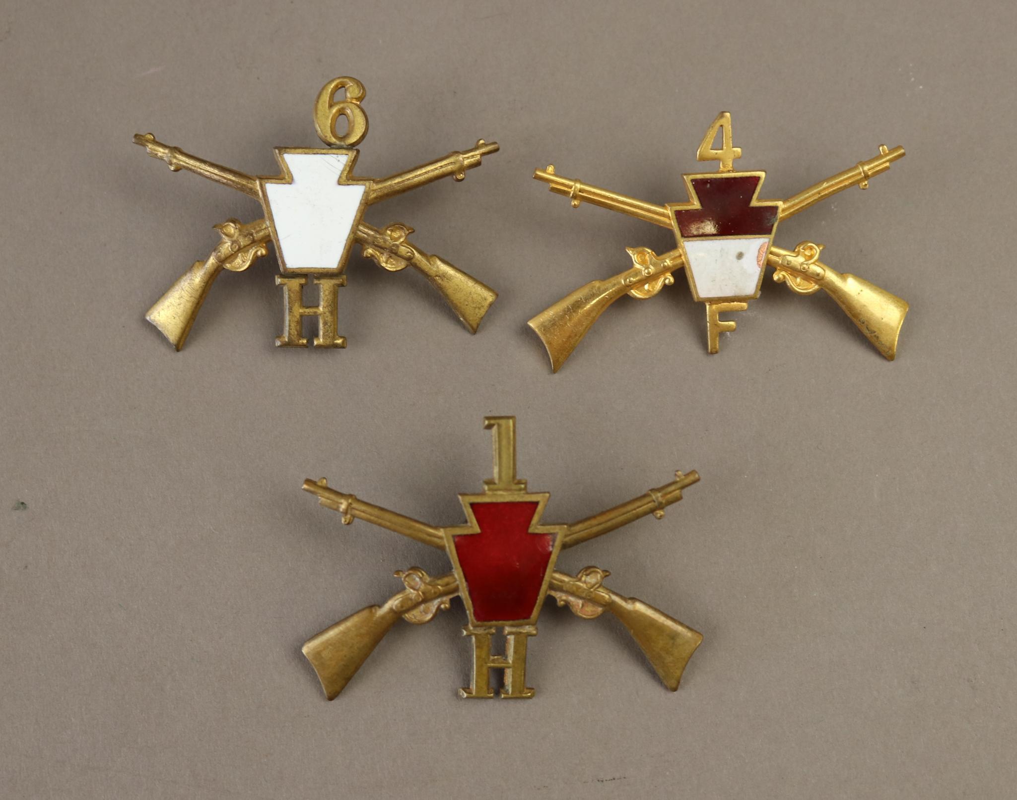 Grouping of Early 20th Century Pennsylvania Military Hat Insignia