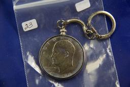 1976 - EISENHOWER DOLLAR IN BEZEL KEY CHAIN