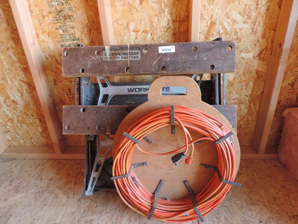 Black & Decker workmate and 2 extension cords with wooden mount.