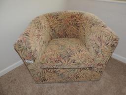 Upholstered flowered loveseat.