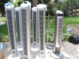 6 48" lasko tower fans with remotes and a Ott-lite lamp all are operable.