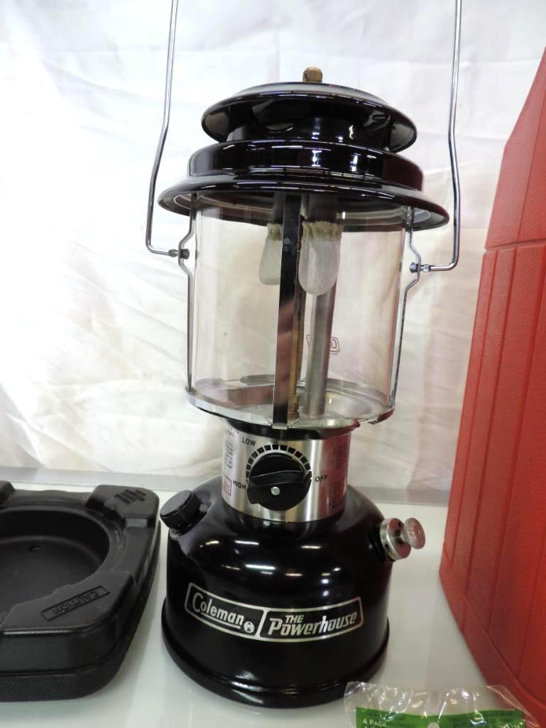 3-1986 marked Coleman powerhouse lantern with hard case, mantles and manual.