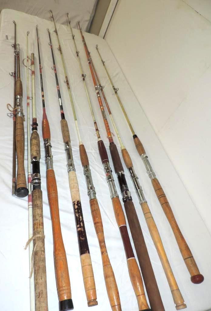 Dawai 1572 Surf casting rod, 7 wood handled rods and 2 piece cork handled rod.